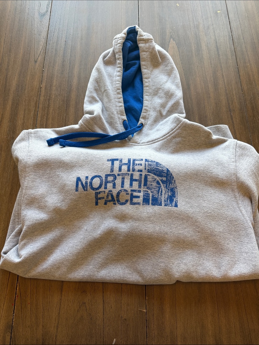 The North Face Mens Gray Hoodie with Blue Logo